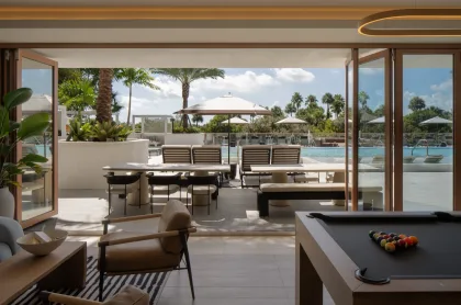 Avara Clubroom opening out to pool